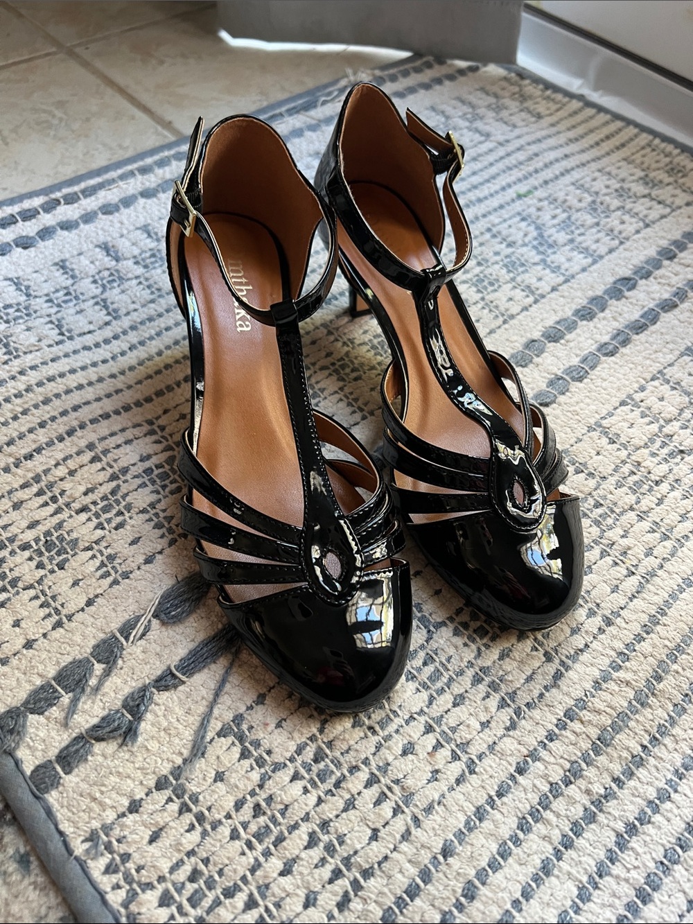 Black Patent T-Strap Heels with Decorative Cutouts